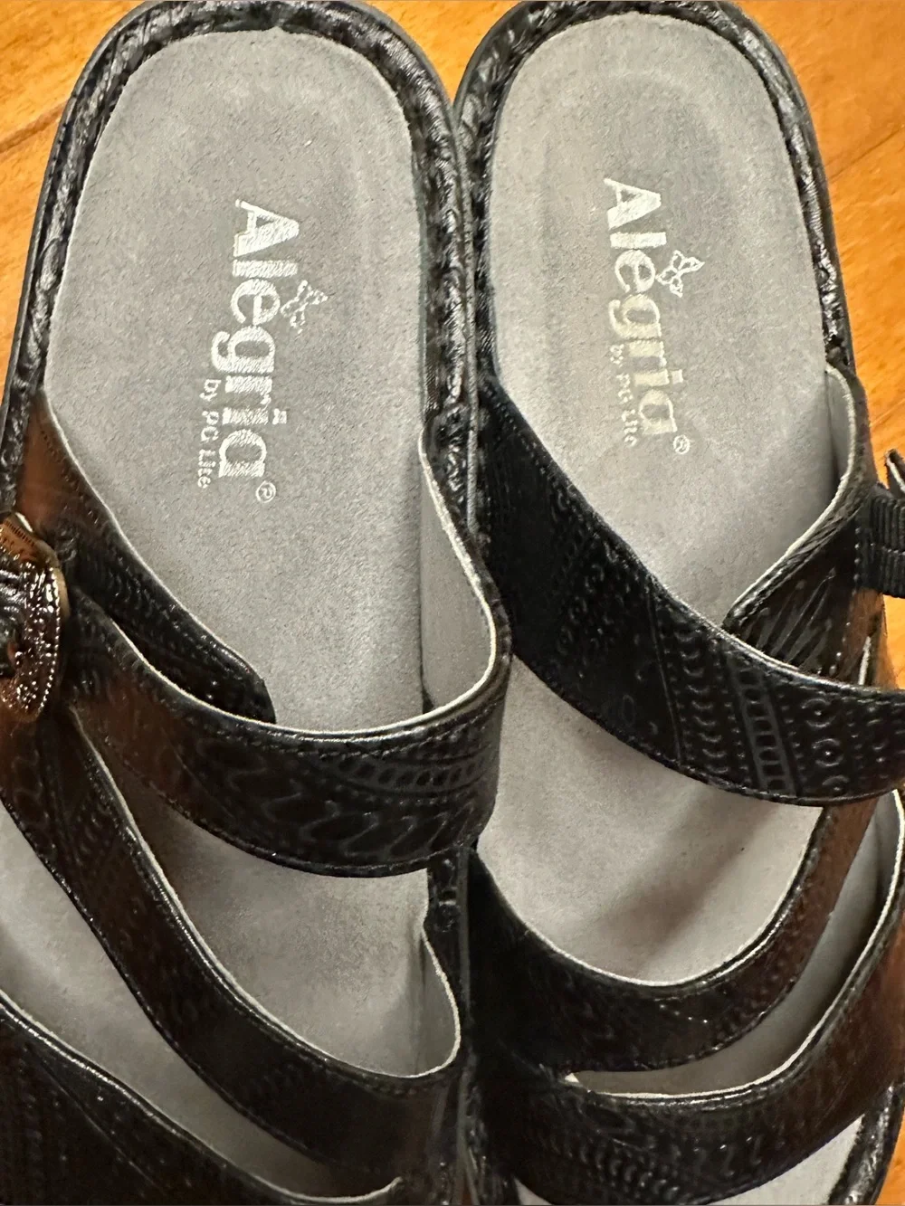 Alegria Black Embossed Leather Slide Sandals with Decorative Medallions